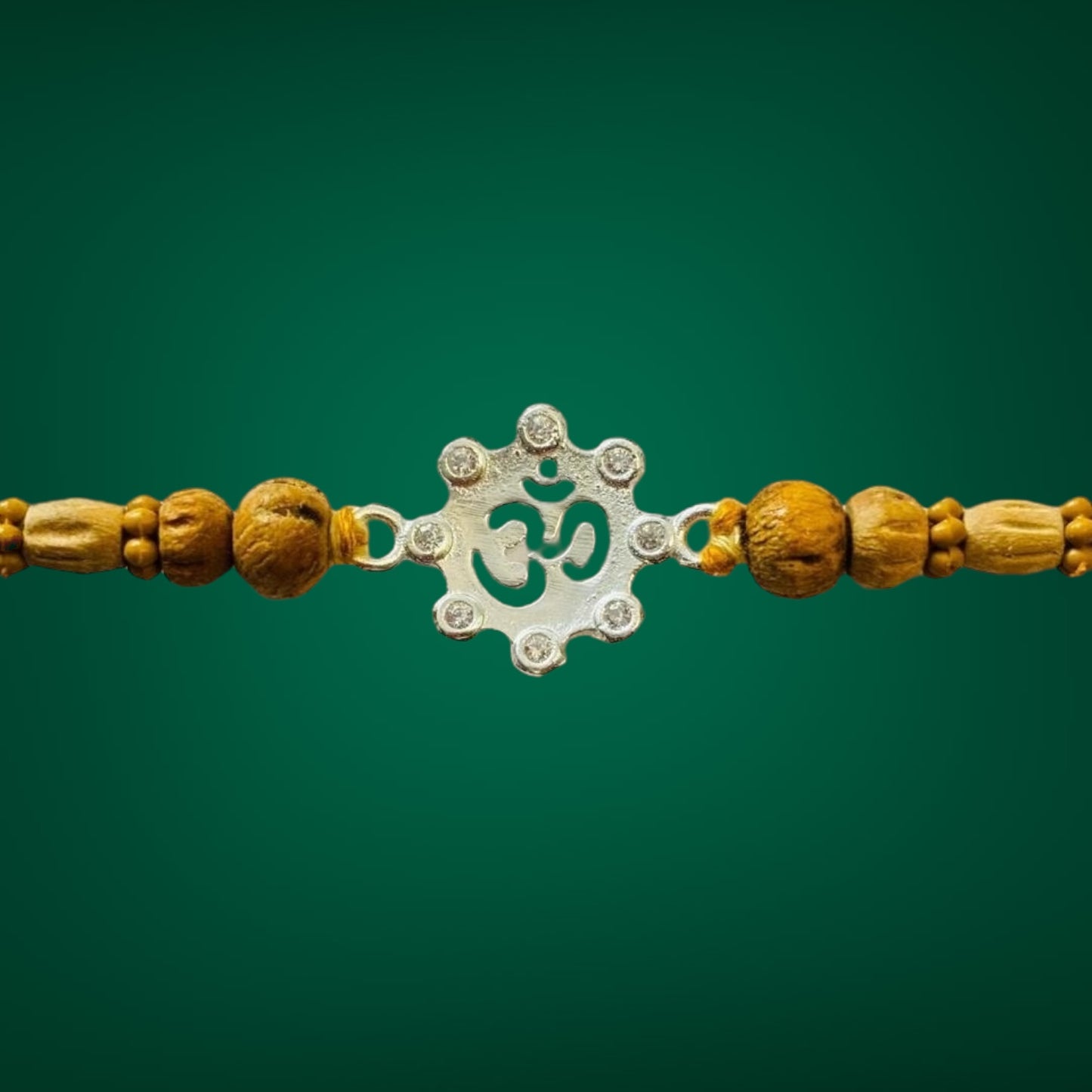 Divine OM Charm Premium Rakhi