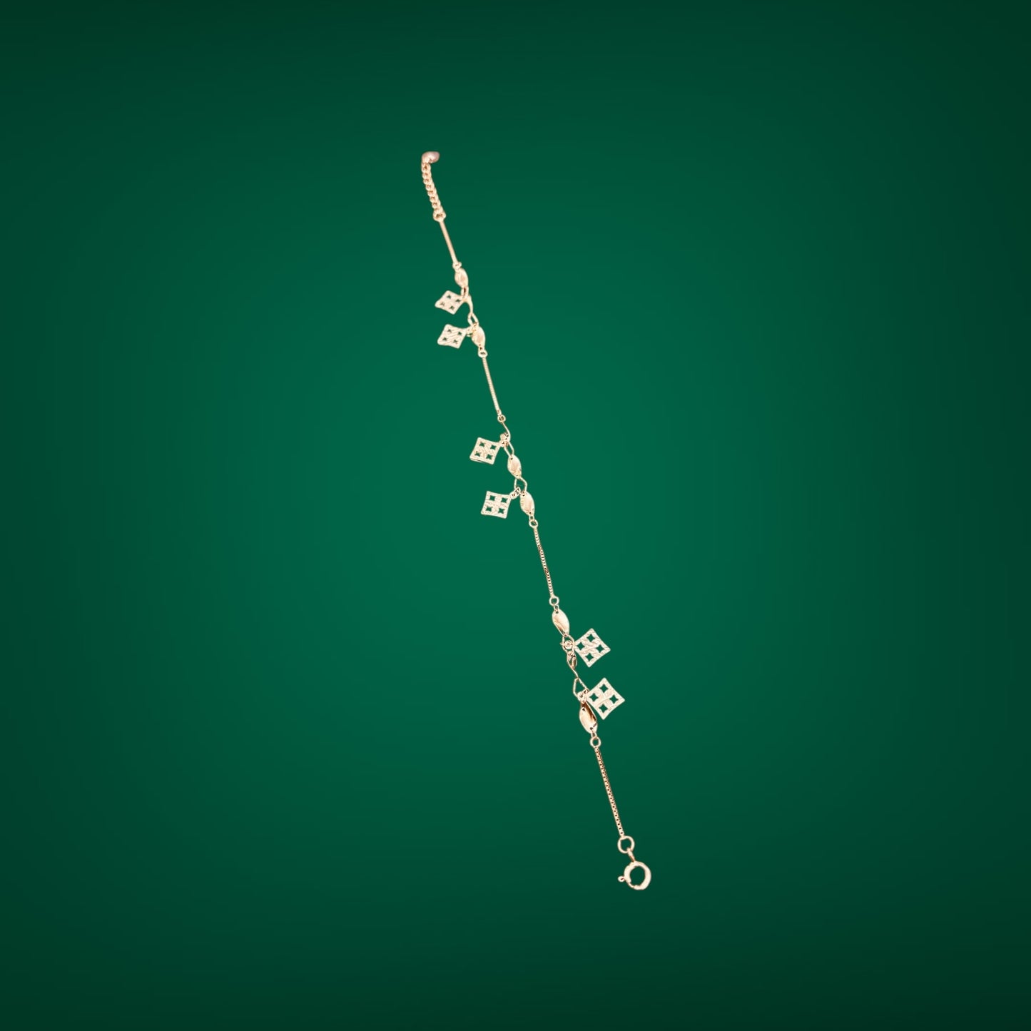 Rose gold bracelet with twisted charms