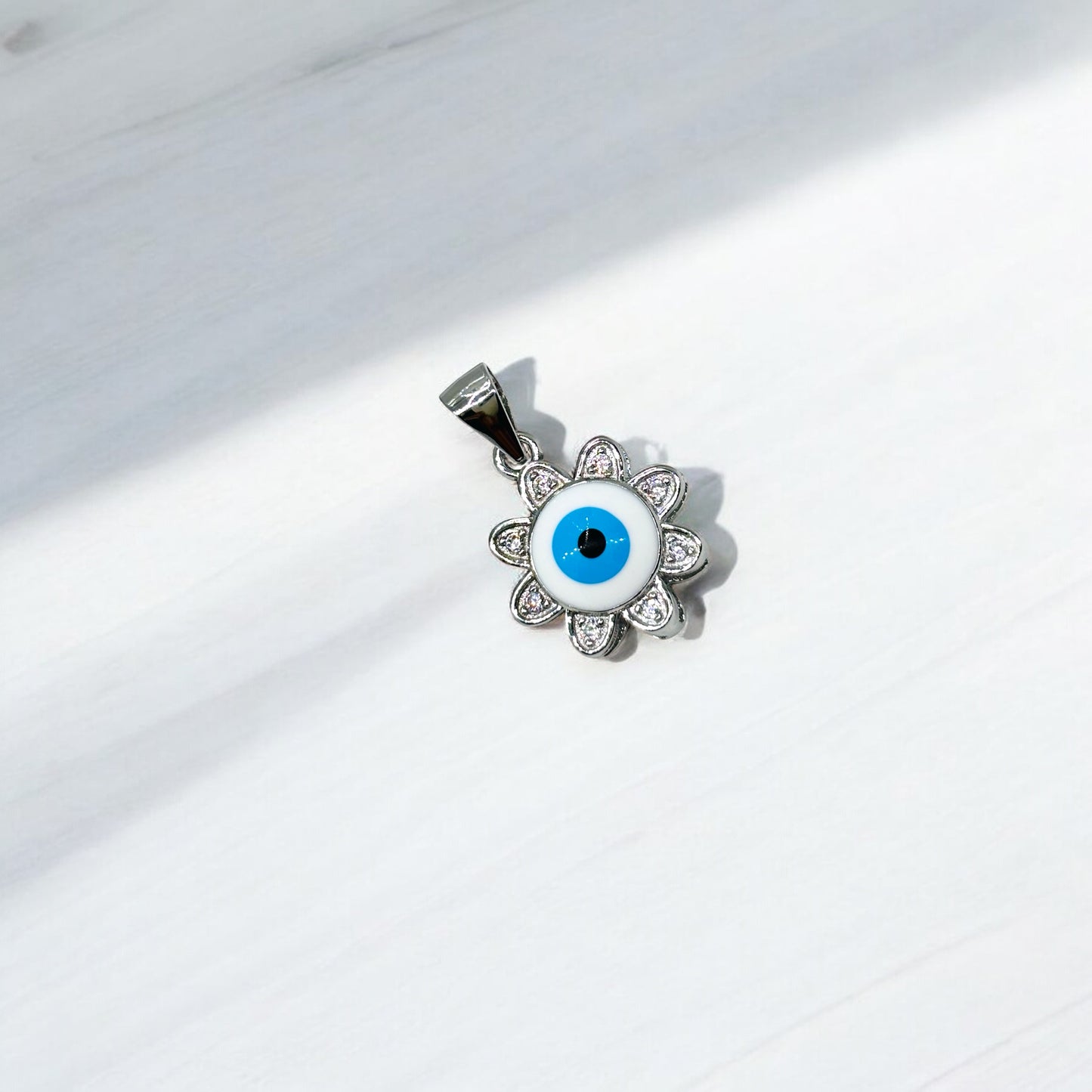 Evil eye sun pendant