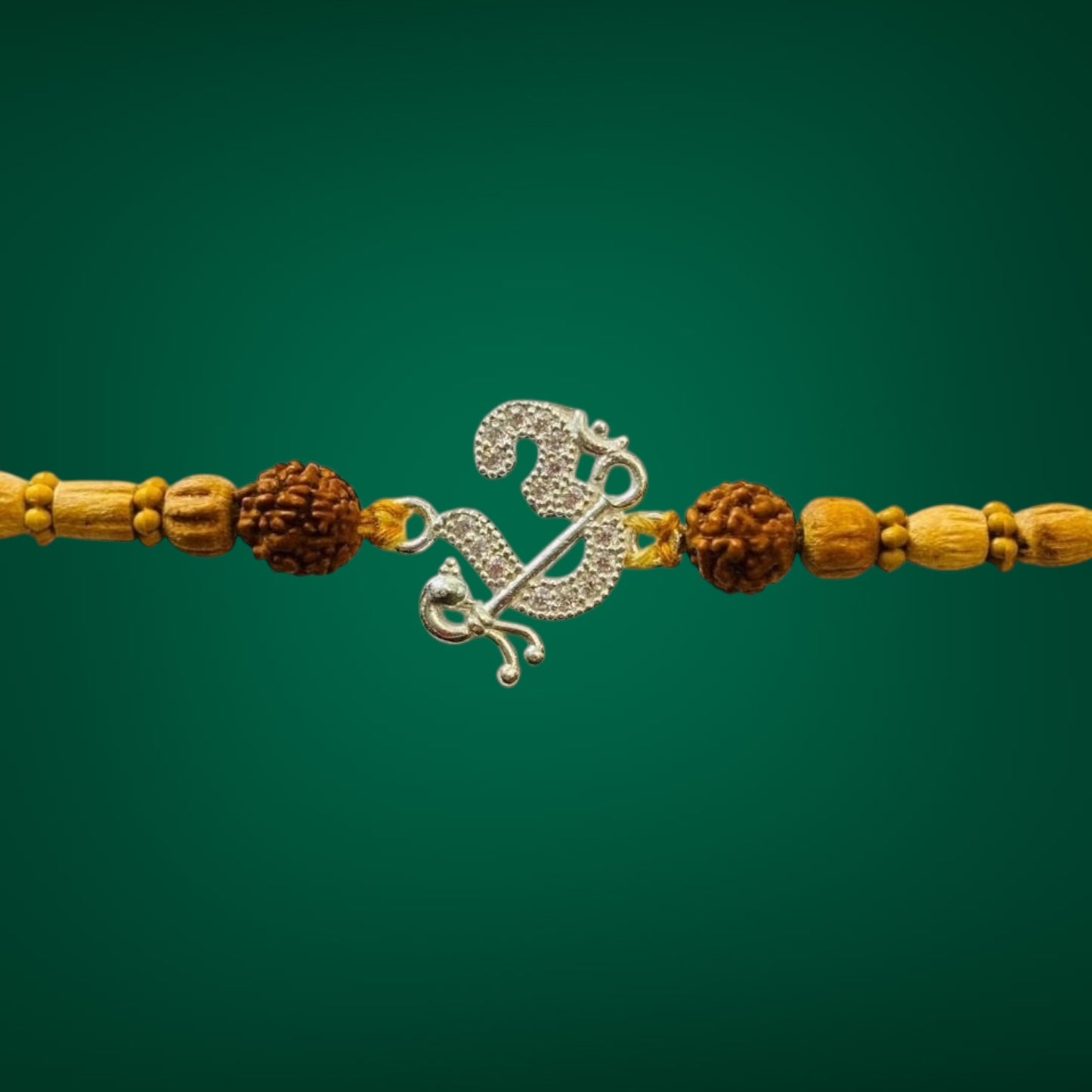 Divine OM Charm Premium Rakhi