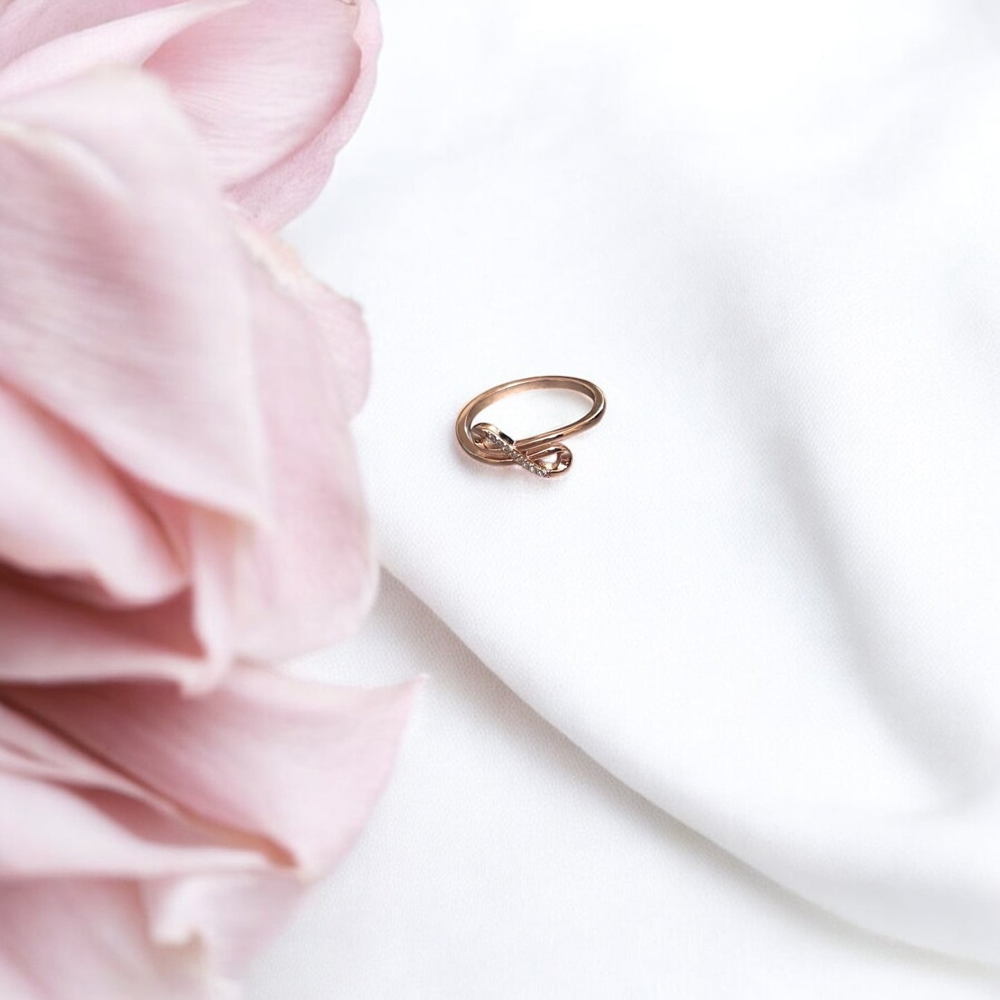 Infinity Interwined rose gold ring