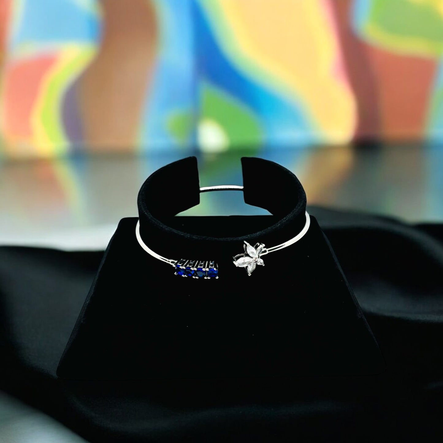 Adjustable Star Bangle with blue stone