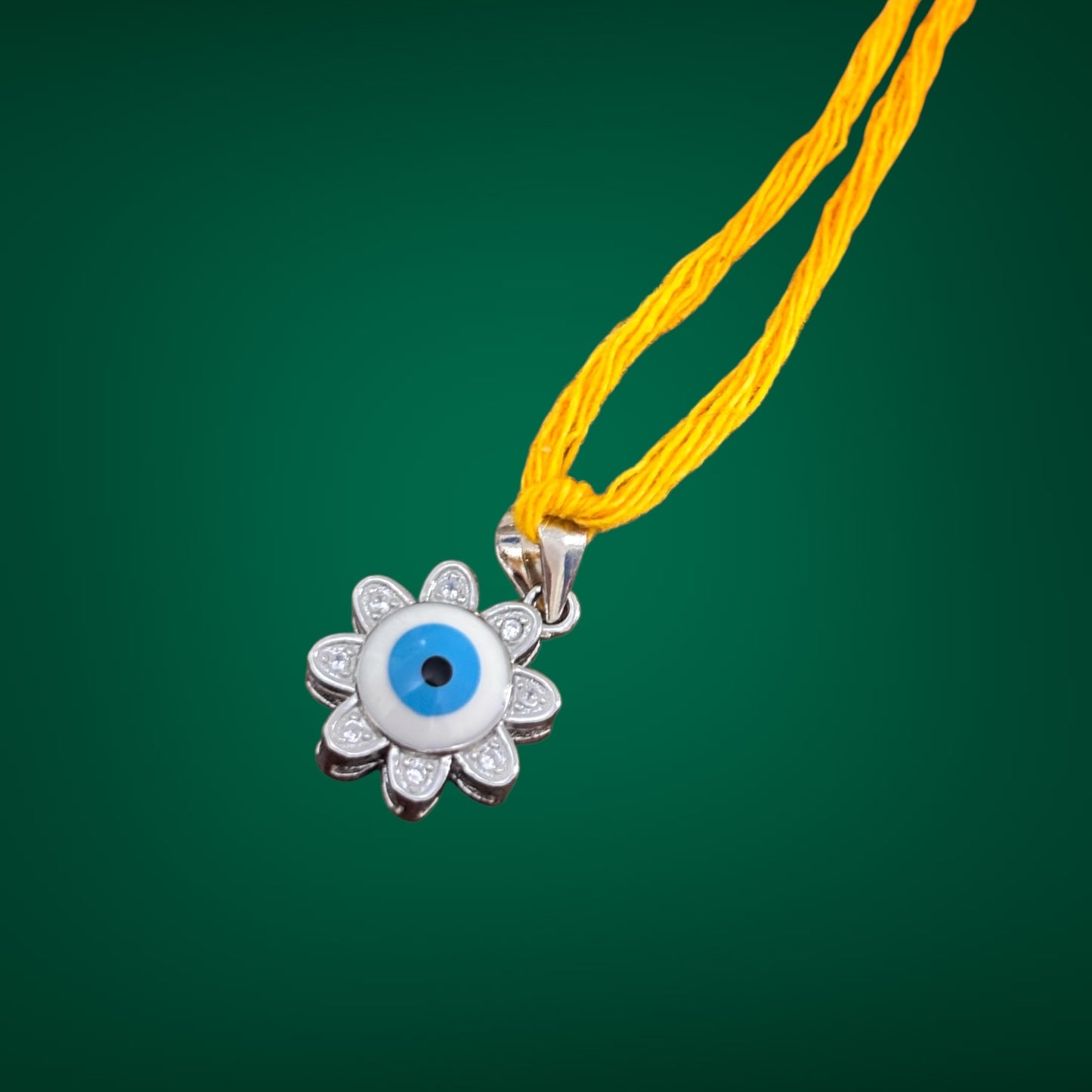 Evil eye sun pendant