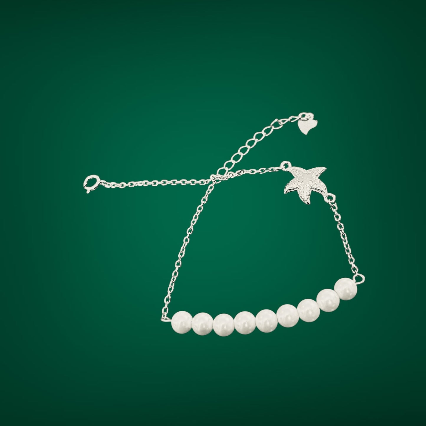 Pearl bracelet with silver star-fish charm