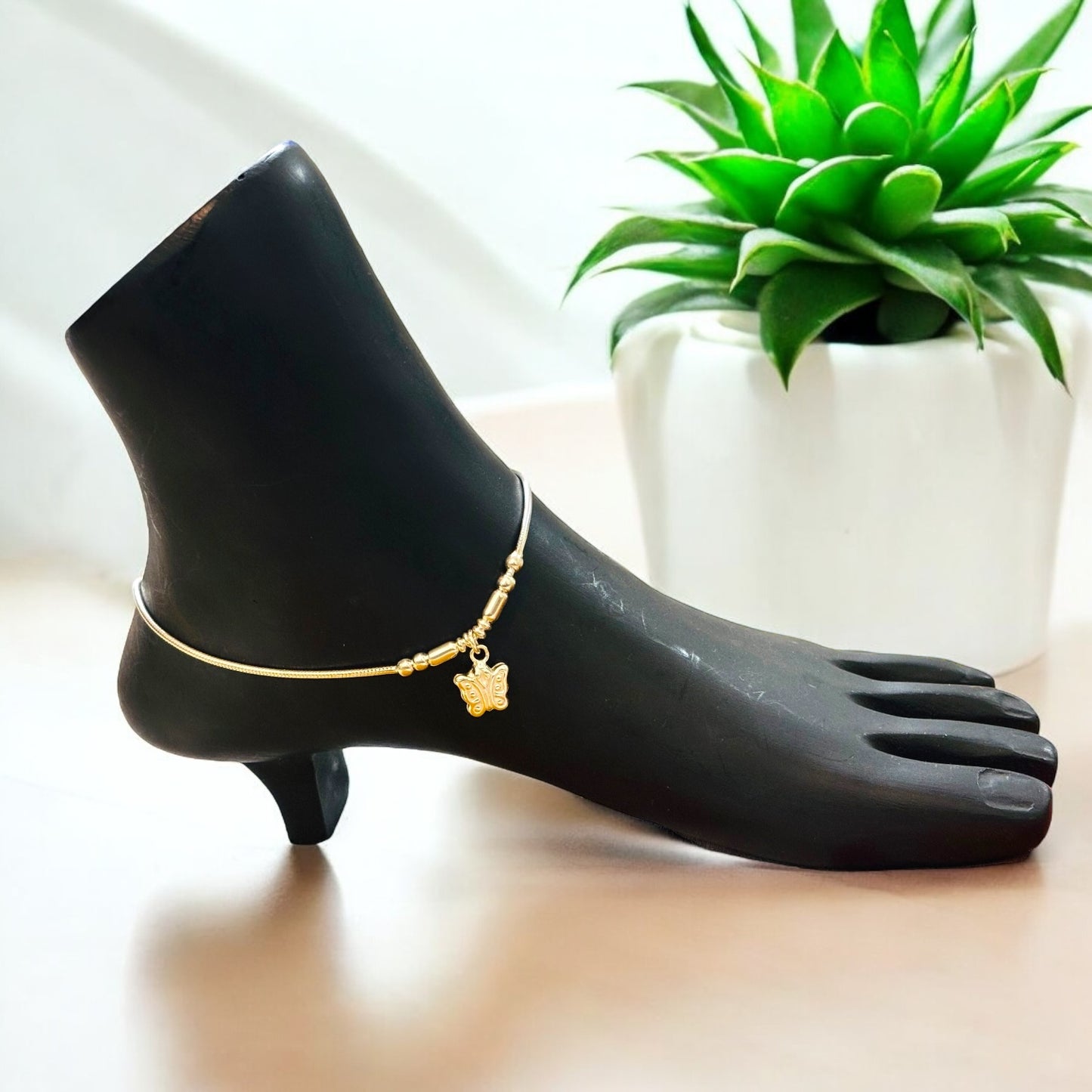 Silver anklet with butterfly charm