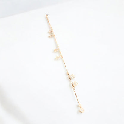 Rose gold bracelet with twisted charms