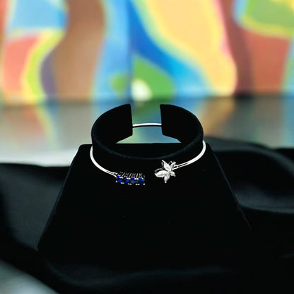 Adjustable Star Bangle with blue stone