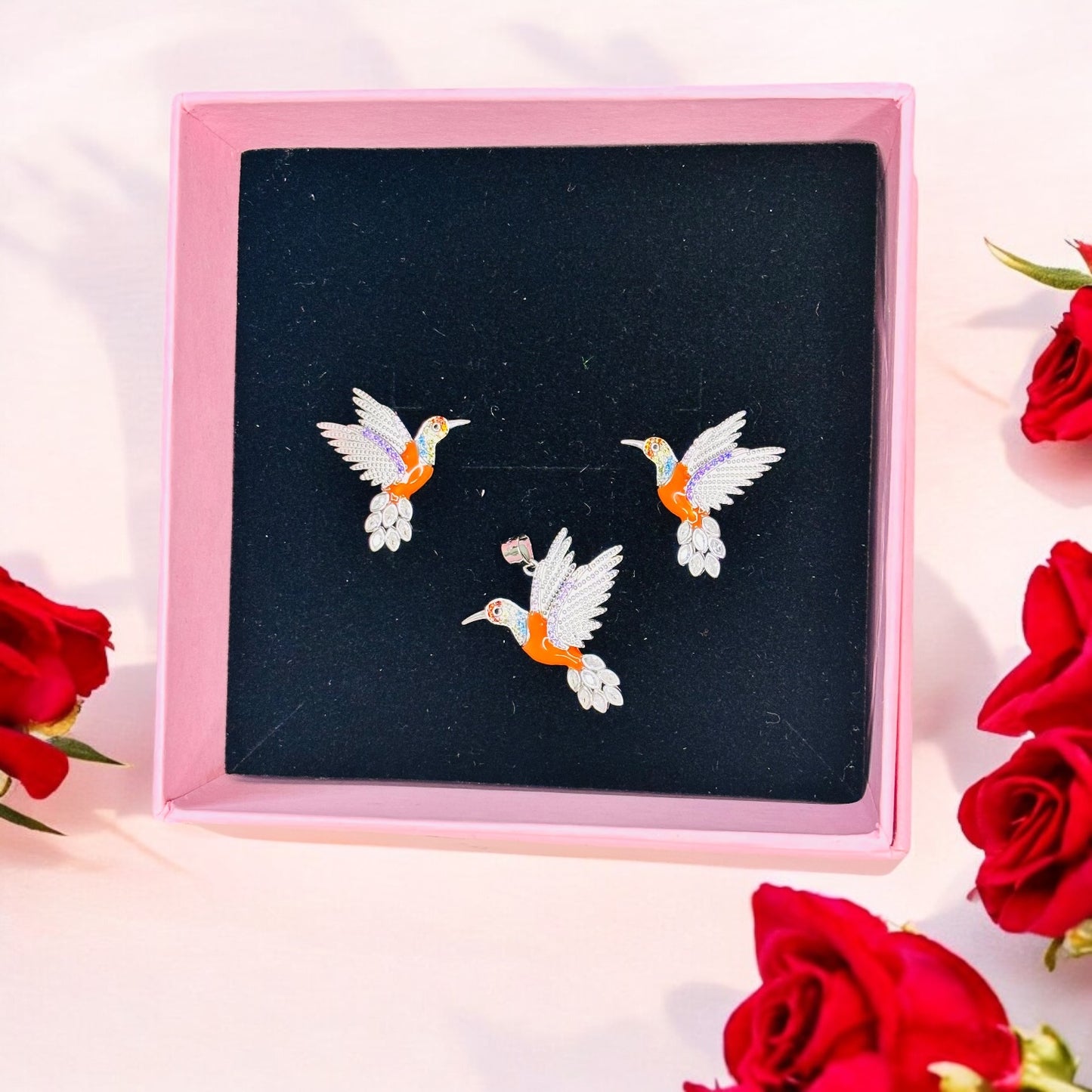 Fly high Orange Humming bird pendant set