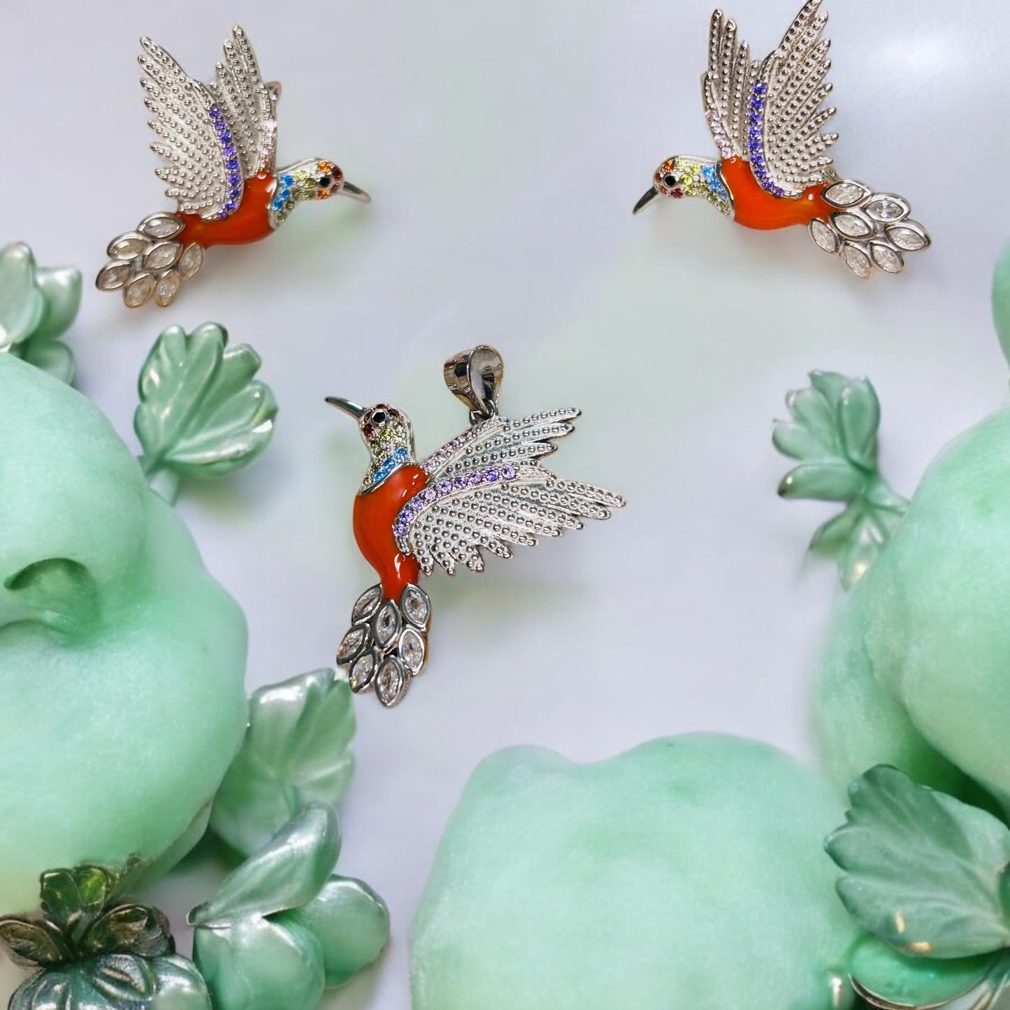 Fly high Orange Humming bird pendant set