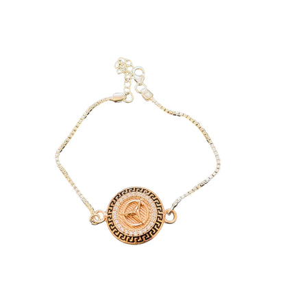 Gold Men’s bracelet with intricate MERCEDEZ BENZ