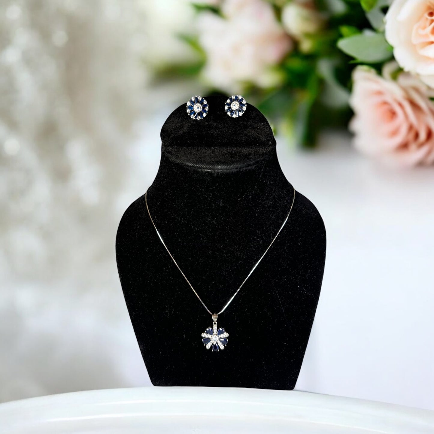 Sapphire floral cut pendant set