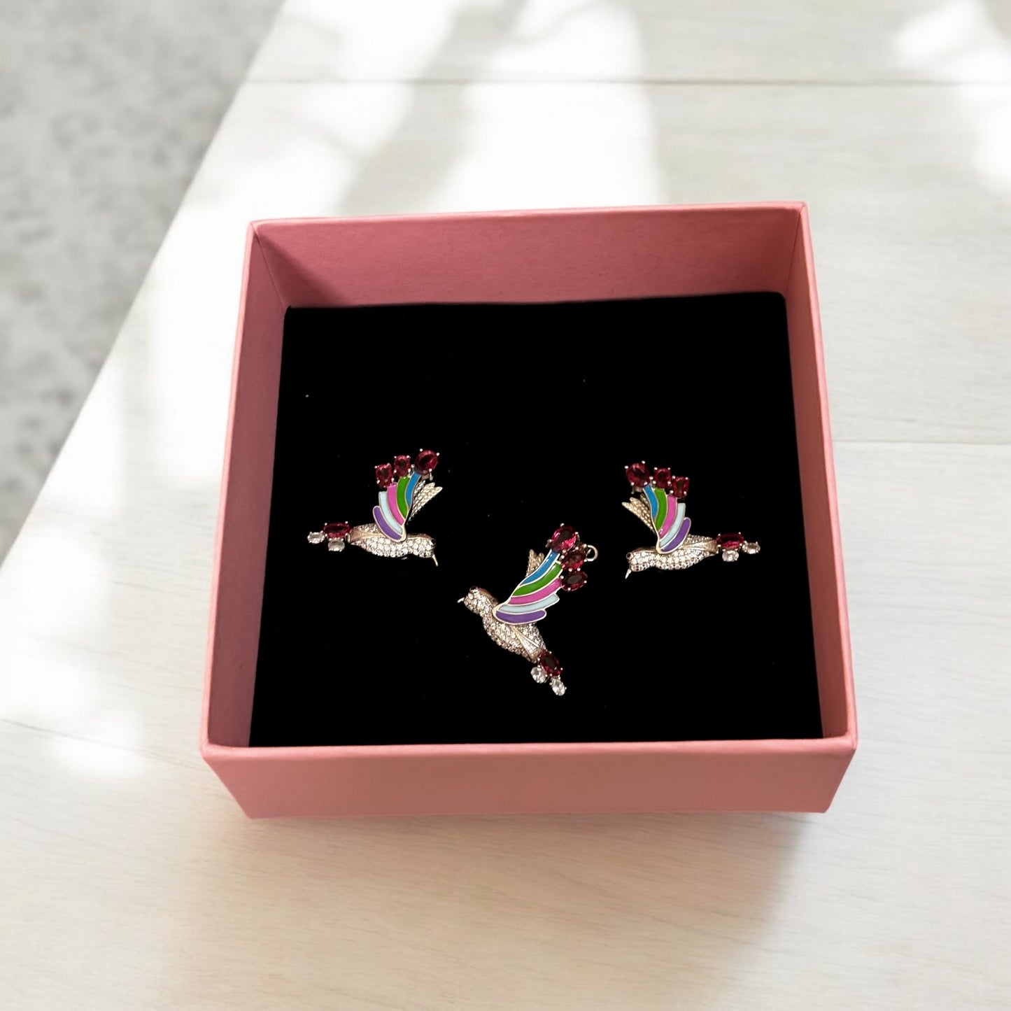 Colourful hummingbird pendant set