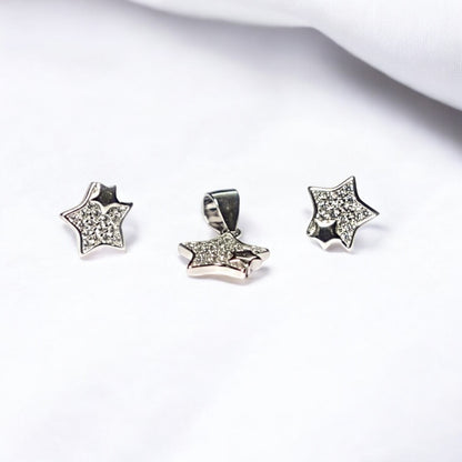 Star-shaped silver jewelry set on a white background