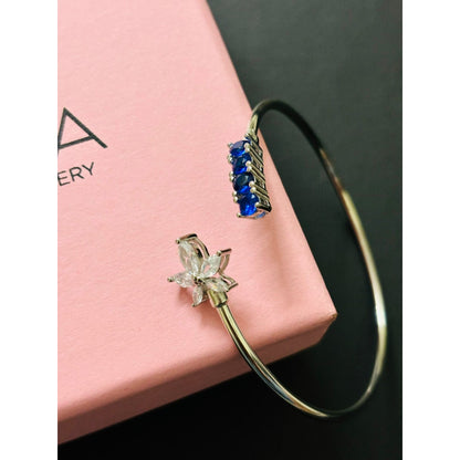 Adjustable Star Bangle with blue stone