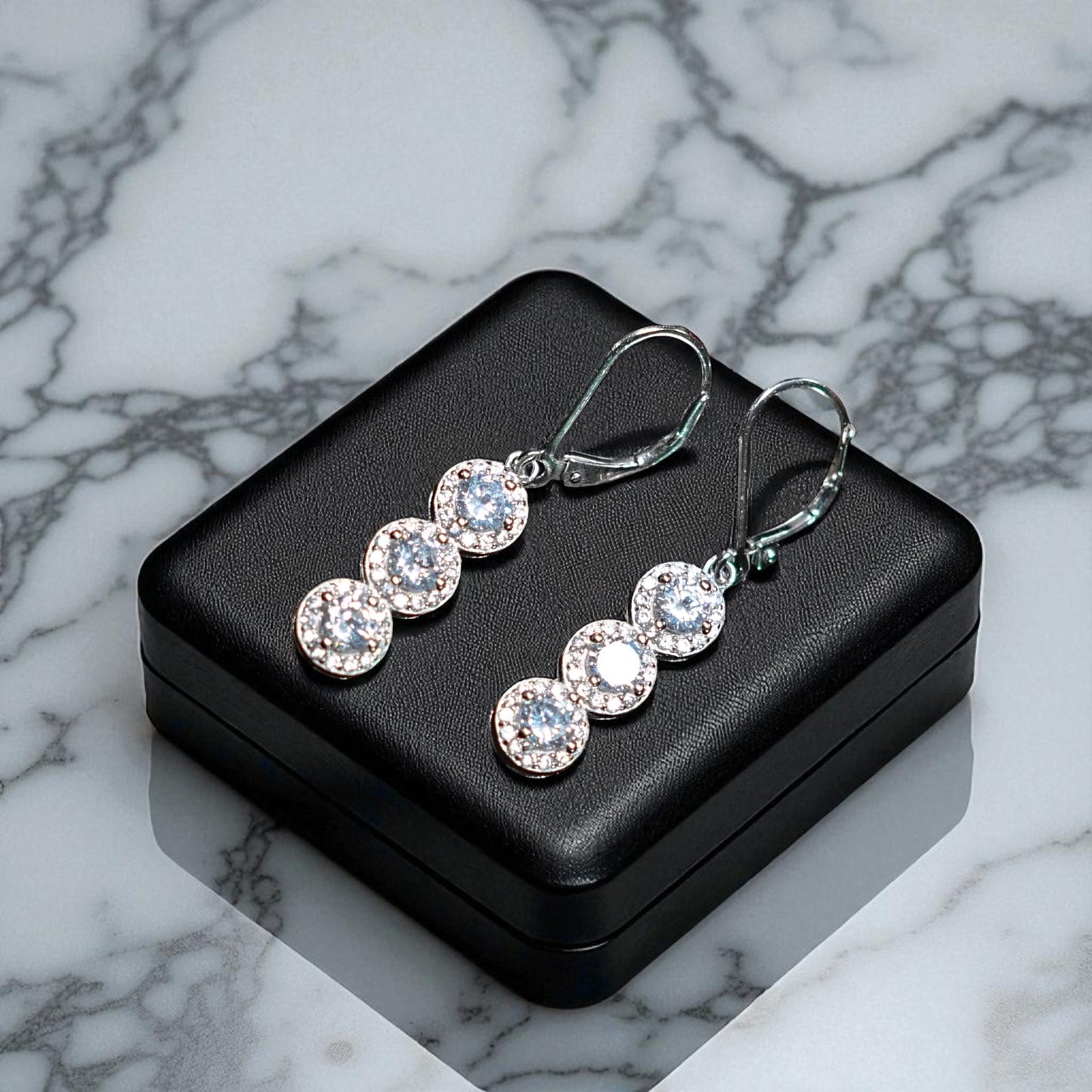 String of Solitaire Dangling Earring
